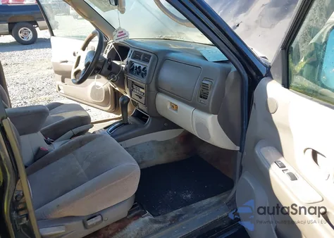 2001 Mitsubishi Montero Sport из США, поврежденный, VIN JA4L521491E016854